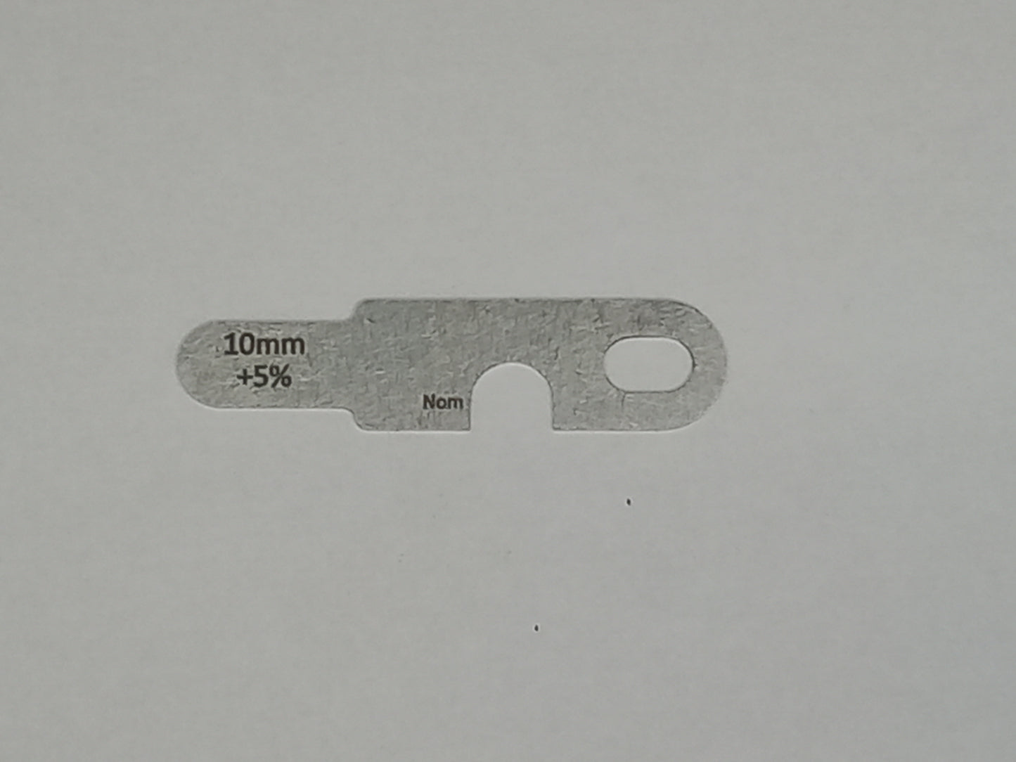 wire rope and sheave gauge on a grey background