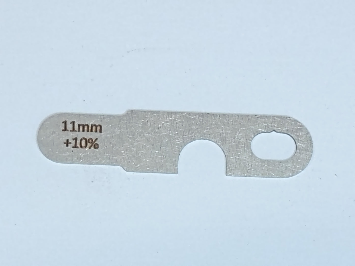 wire rope and sheave gauge on a grey background