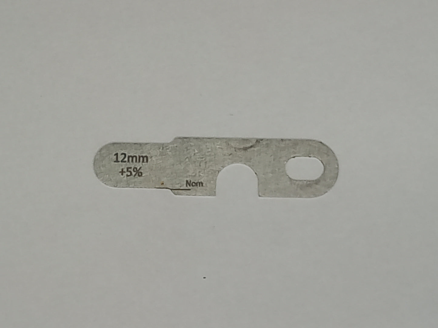 wire rope and sheave gauge on a grey background