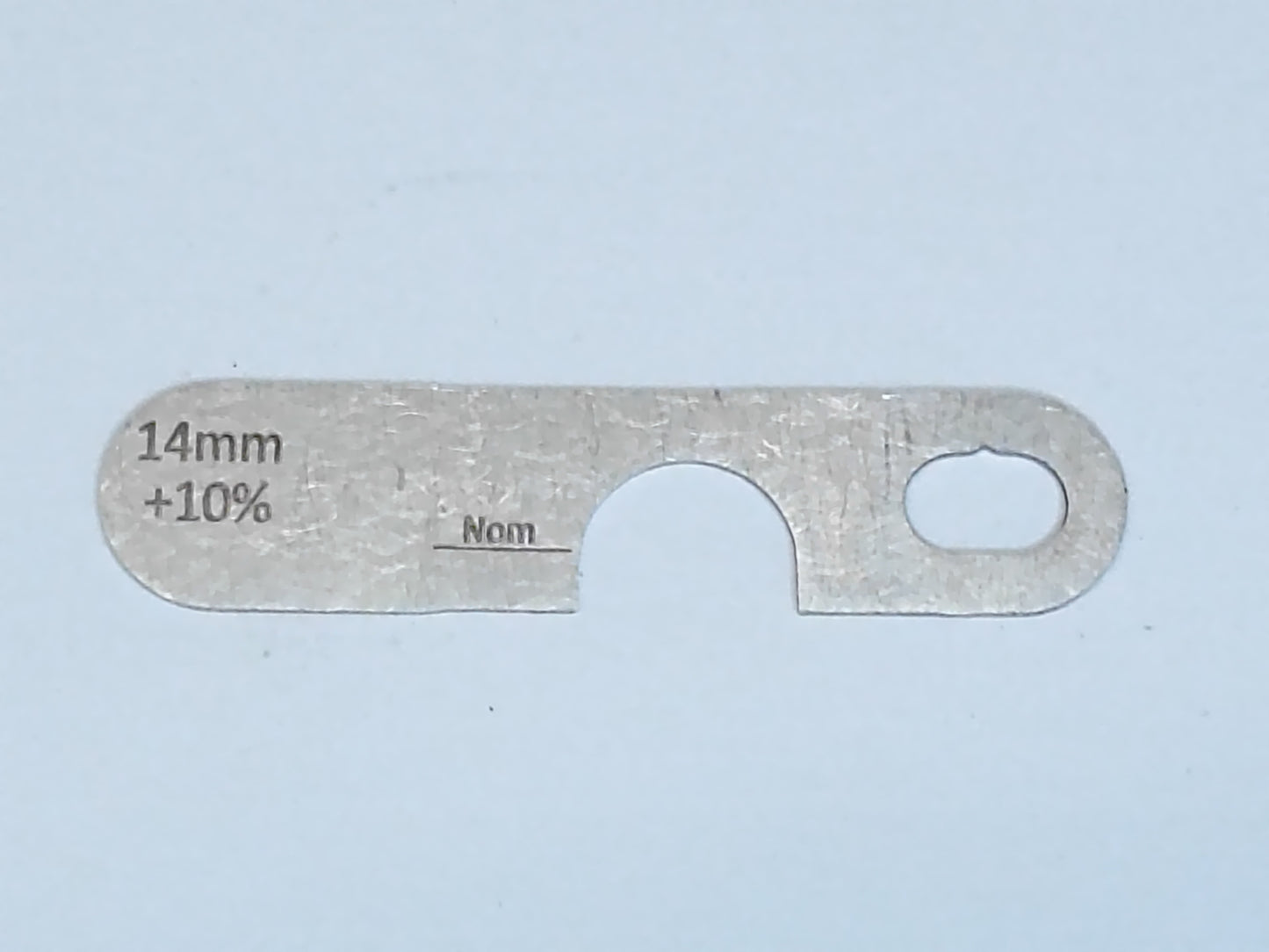 wire rope and sheave gauge on a grey background