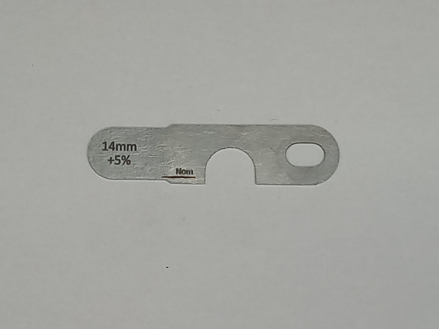 wire rope and sheave gauge on a grey background
