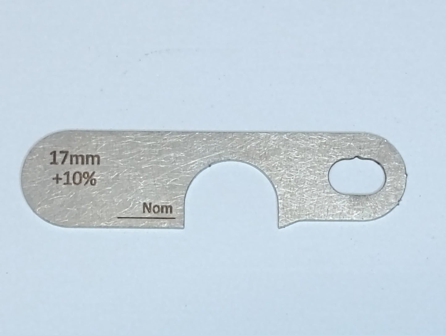 wire rope and sheave gauge on a grey background