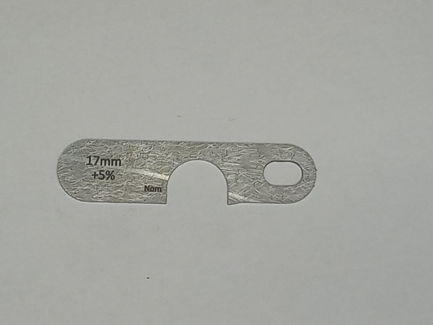 wire rope and sheave gauge on a grey background