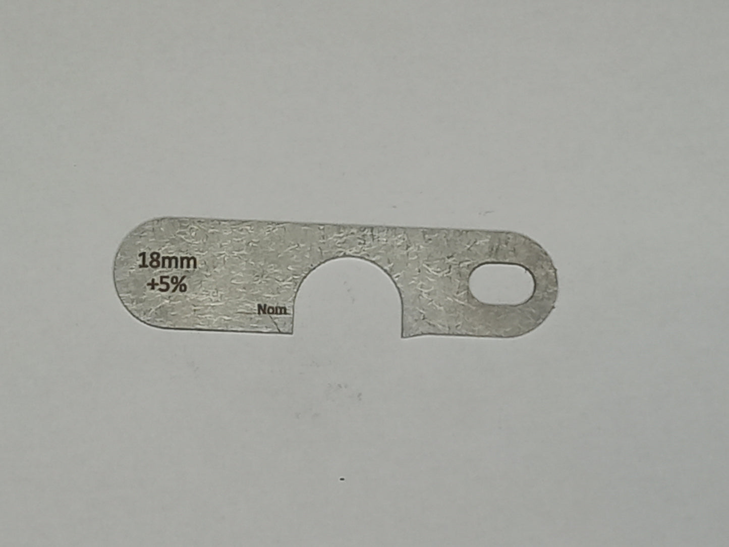 wire rope and sheave gauge on a grey background