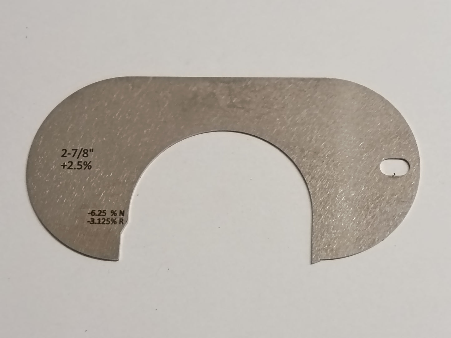 wire rope and sheave gauge on a grey background