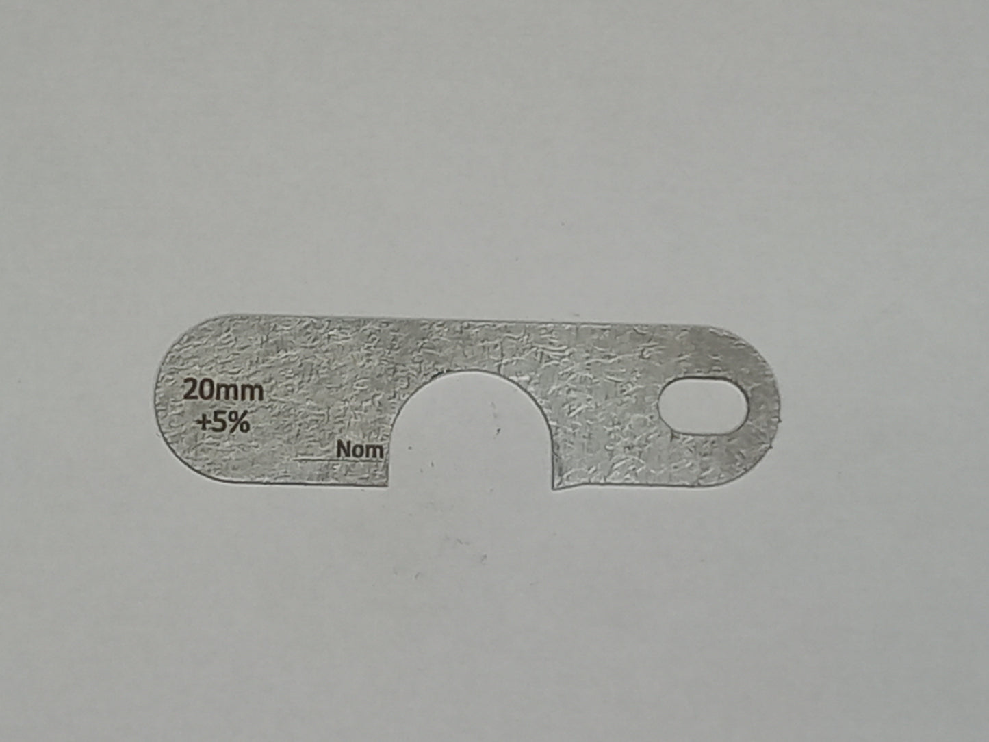 wire rope and sheave gauge on a grey background