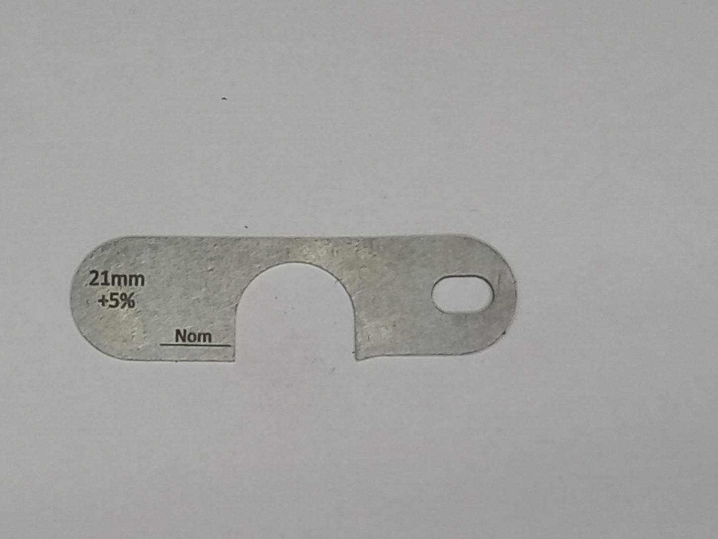 wire rope and sheave gauge on a grey background