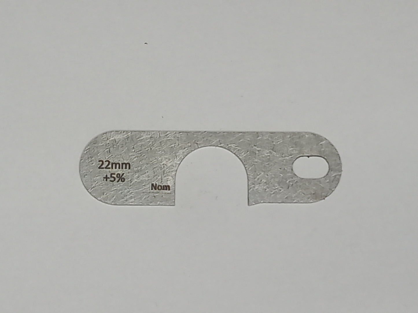 wire rope and sheave gauge on a grey background