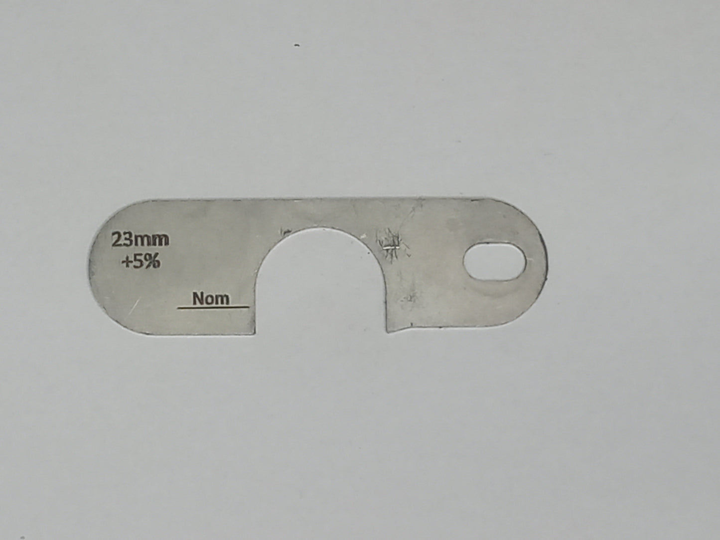 wire rope and sheave gauge on a grey background