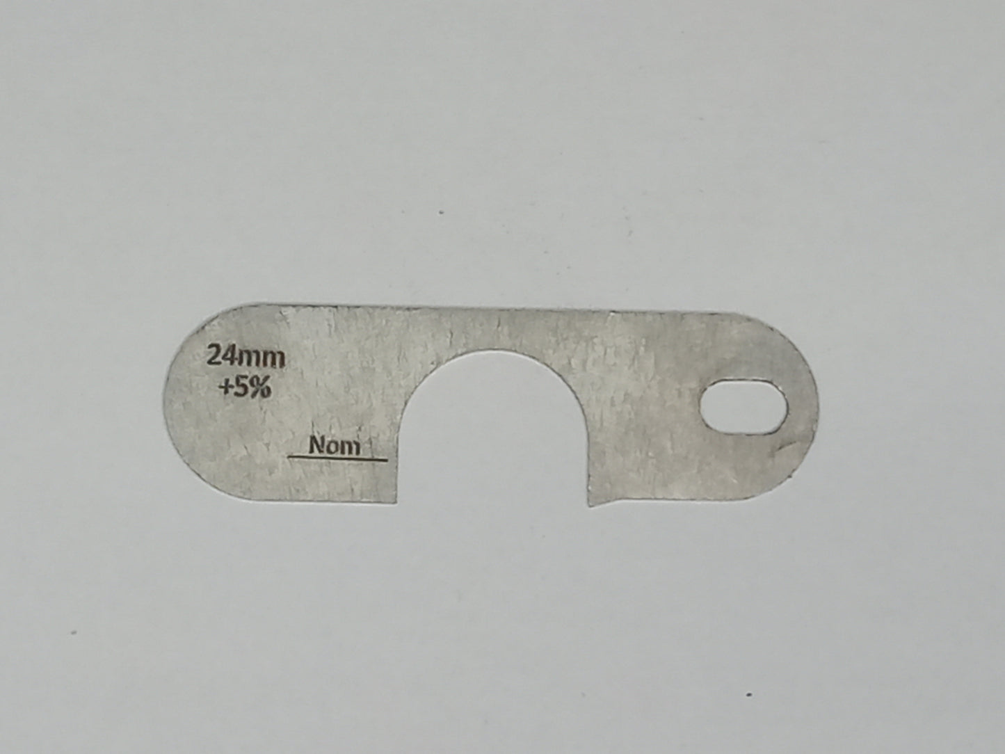 wire rope and sheave gauge on a grey background