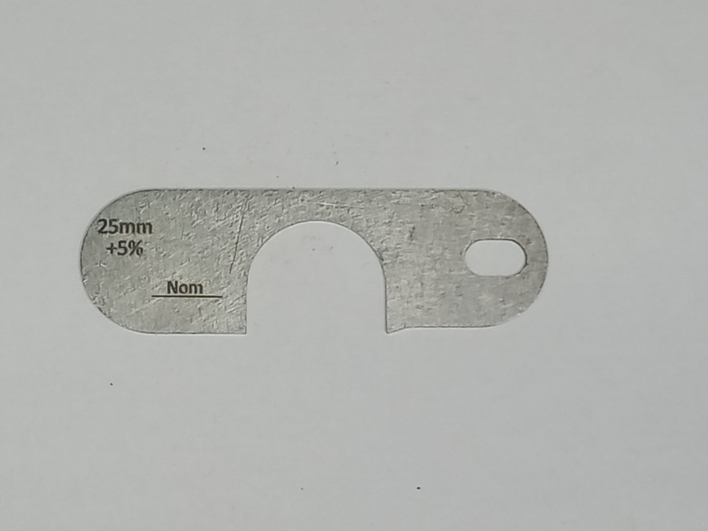 wire rope and sheave gauge on a grey background