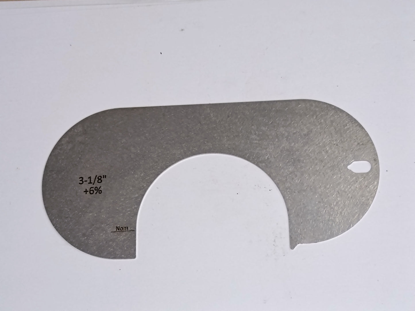wire rope and sheave gauge on a grey background