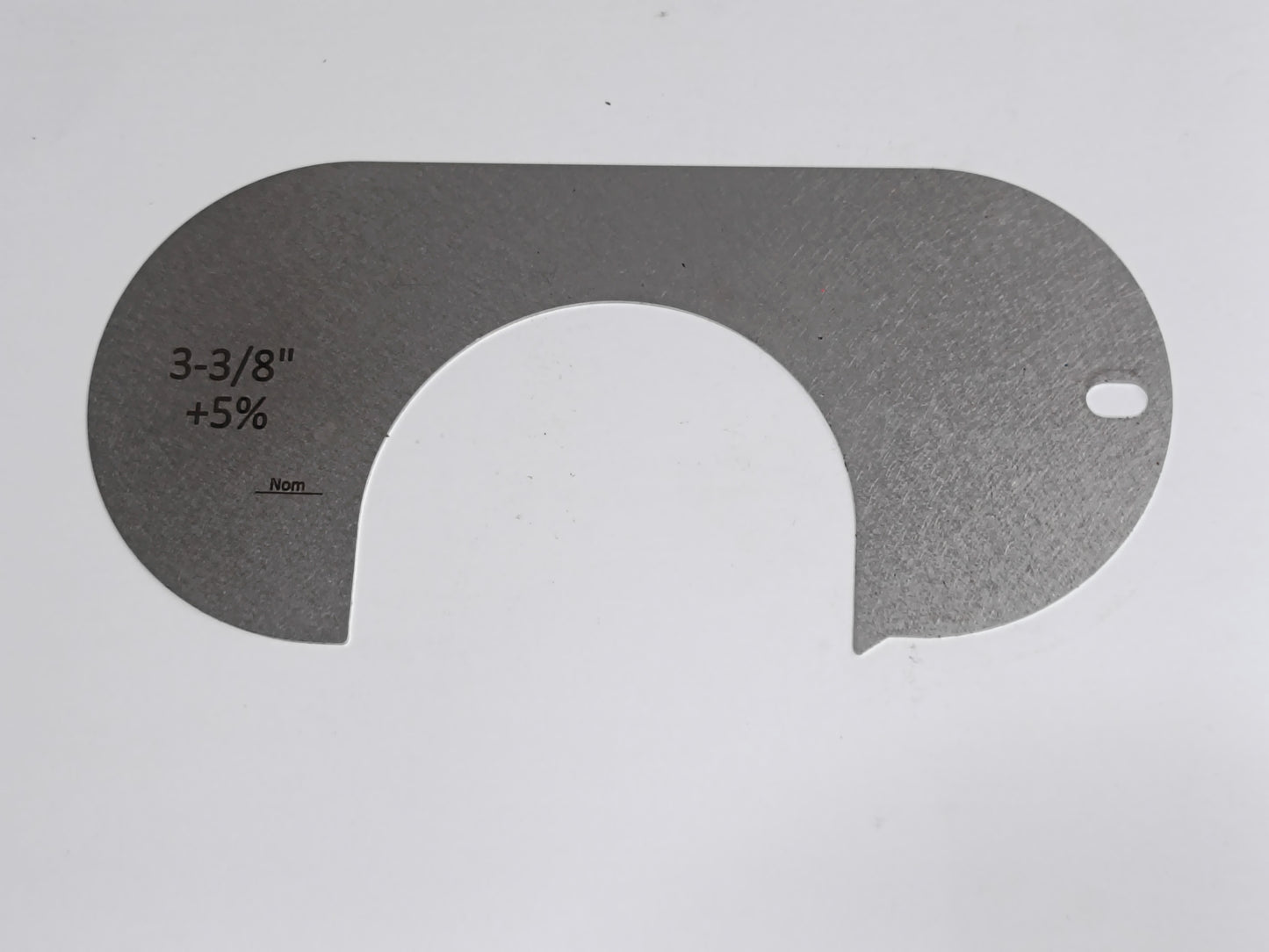 wire rope and sheave gauge on a grey background