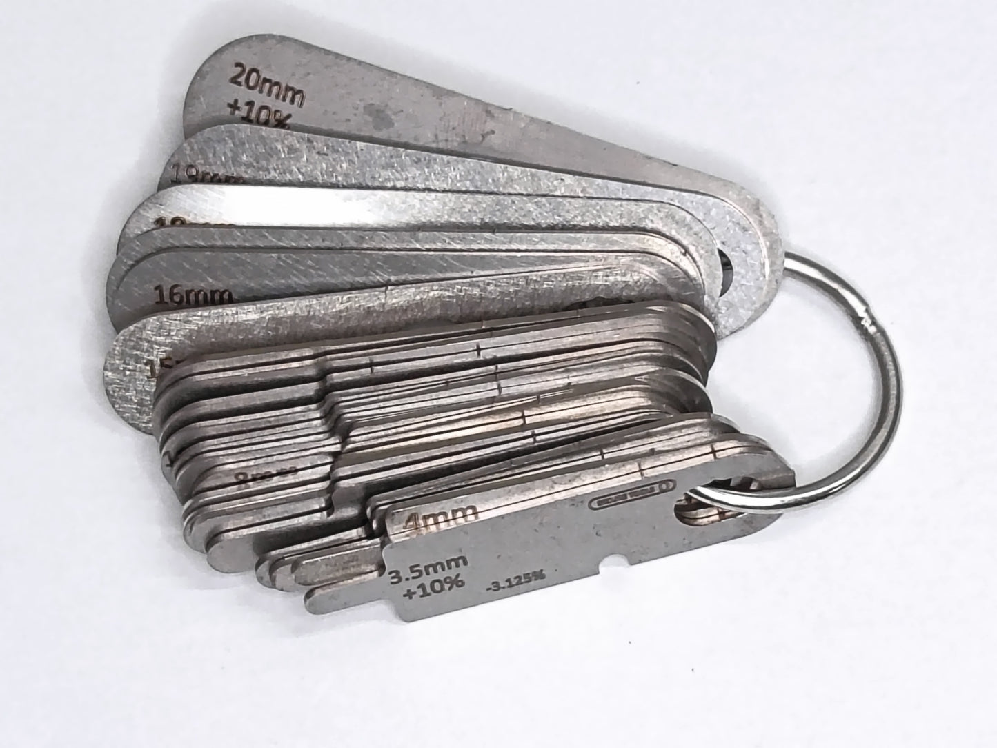 wire rope and sheave gauge on a grey background
