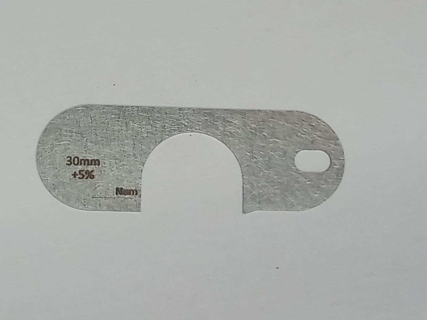 wire rope and sheave gauge on a grey background