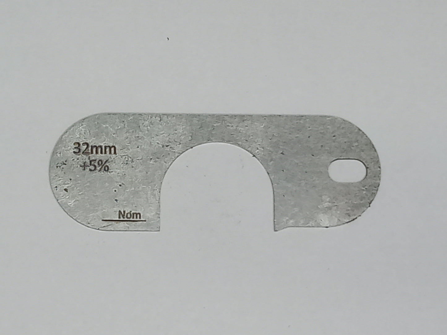 wire rope and sheave gauge on a grey background