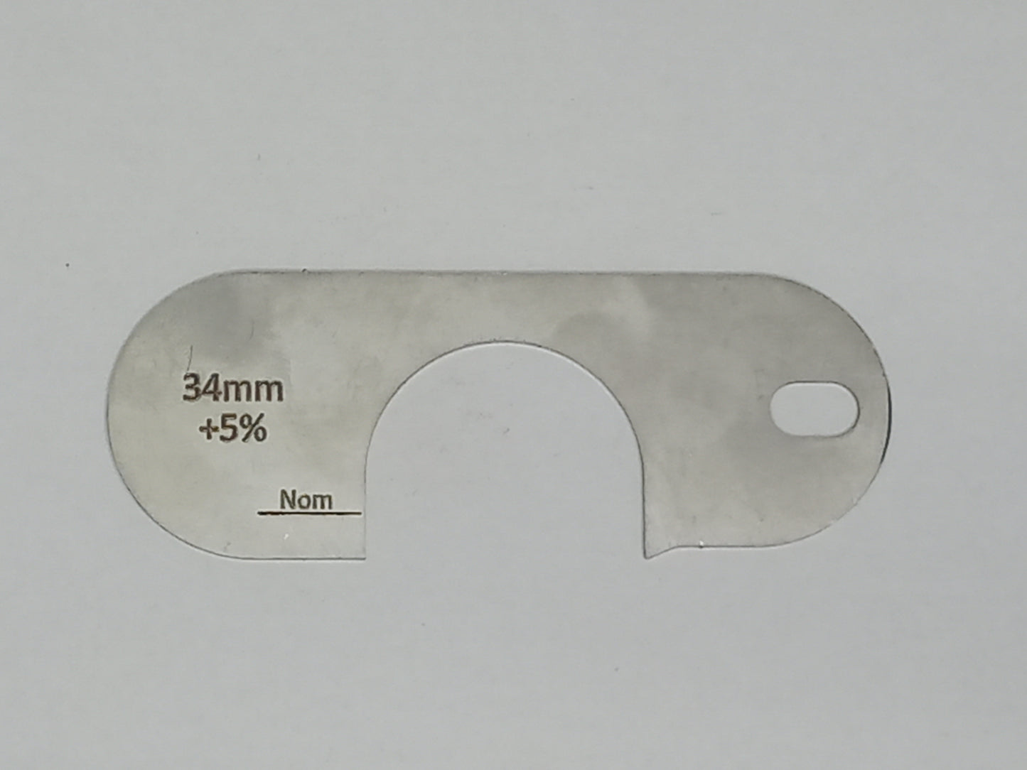 wire rope and sheave gauge on a grey background