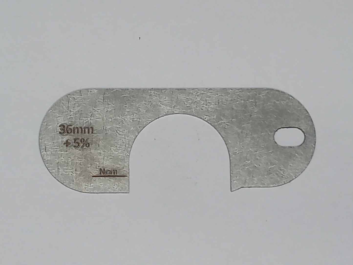 wire rope and sheave gauge on a grey background