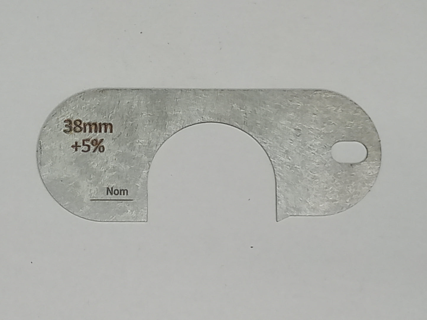 wire rope and sheave gauge on a grey background
