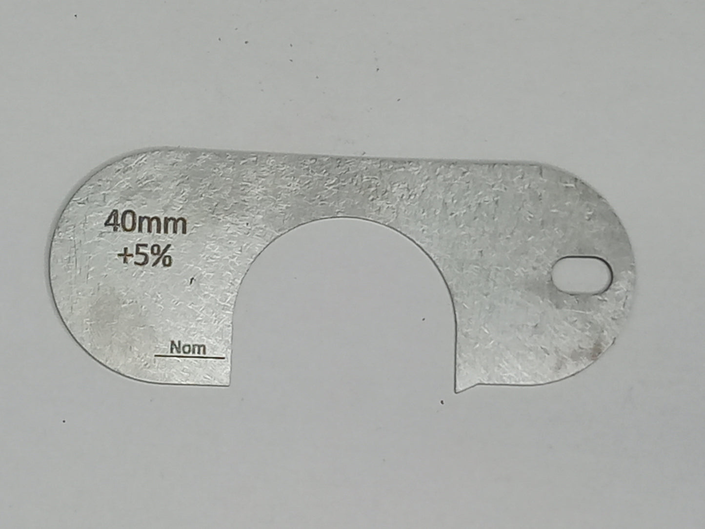 wire rope and sheave gauge on a grey background