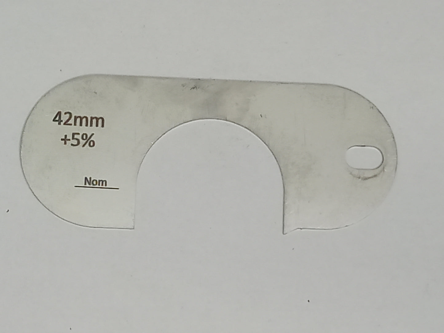 wire rope and sheave gauge on a grey background
