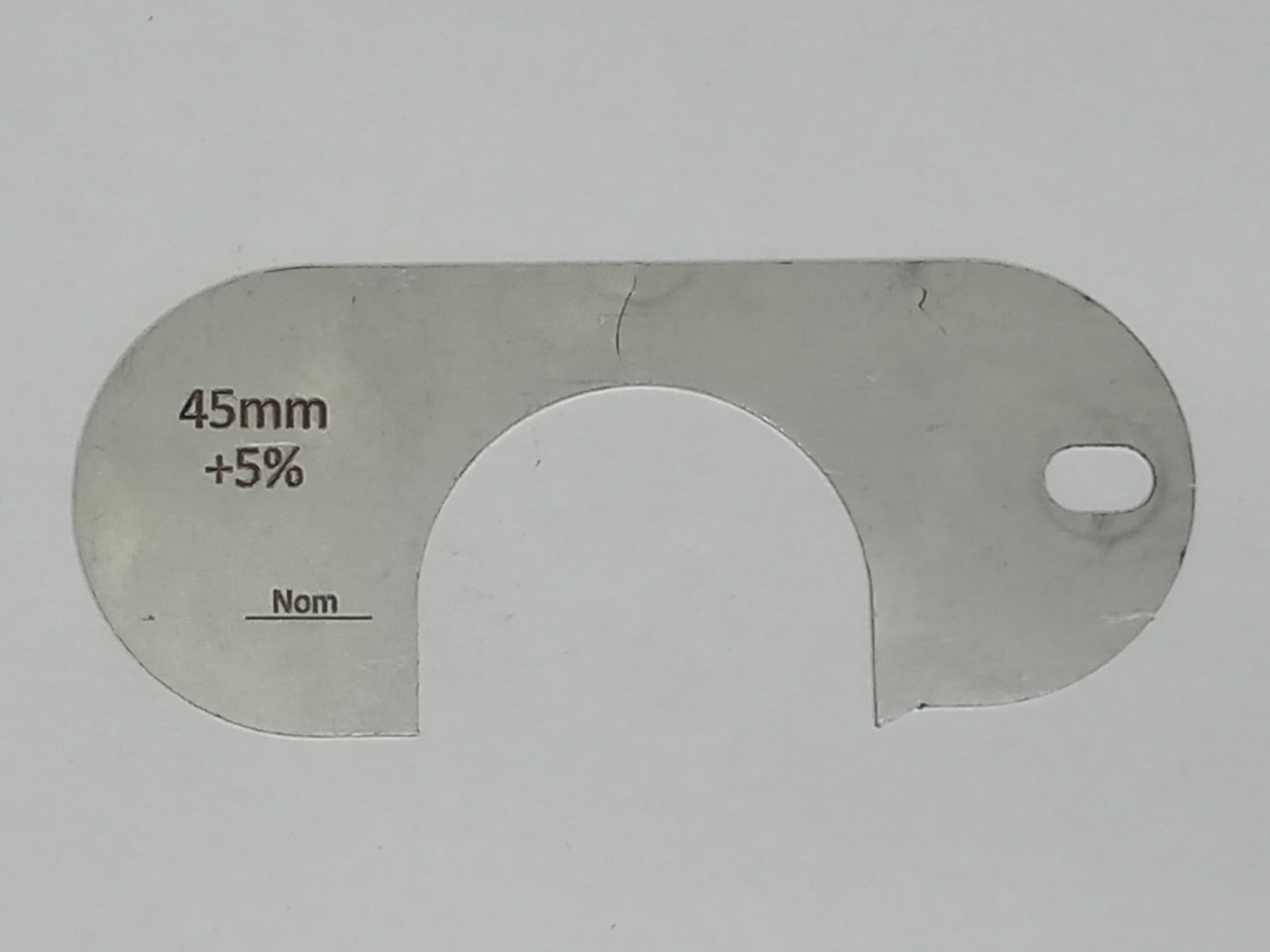 wire rope and sheave gauge on a grey background