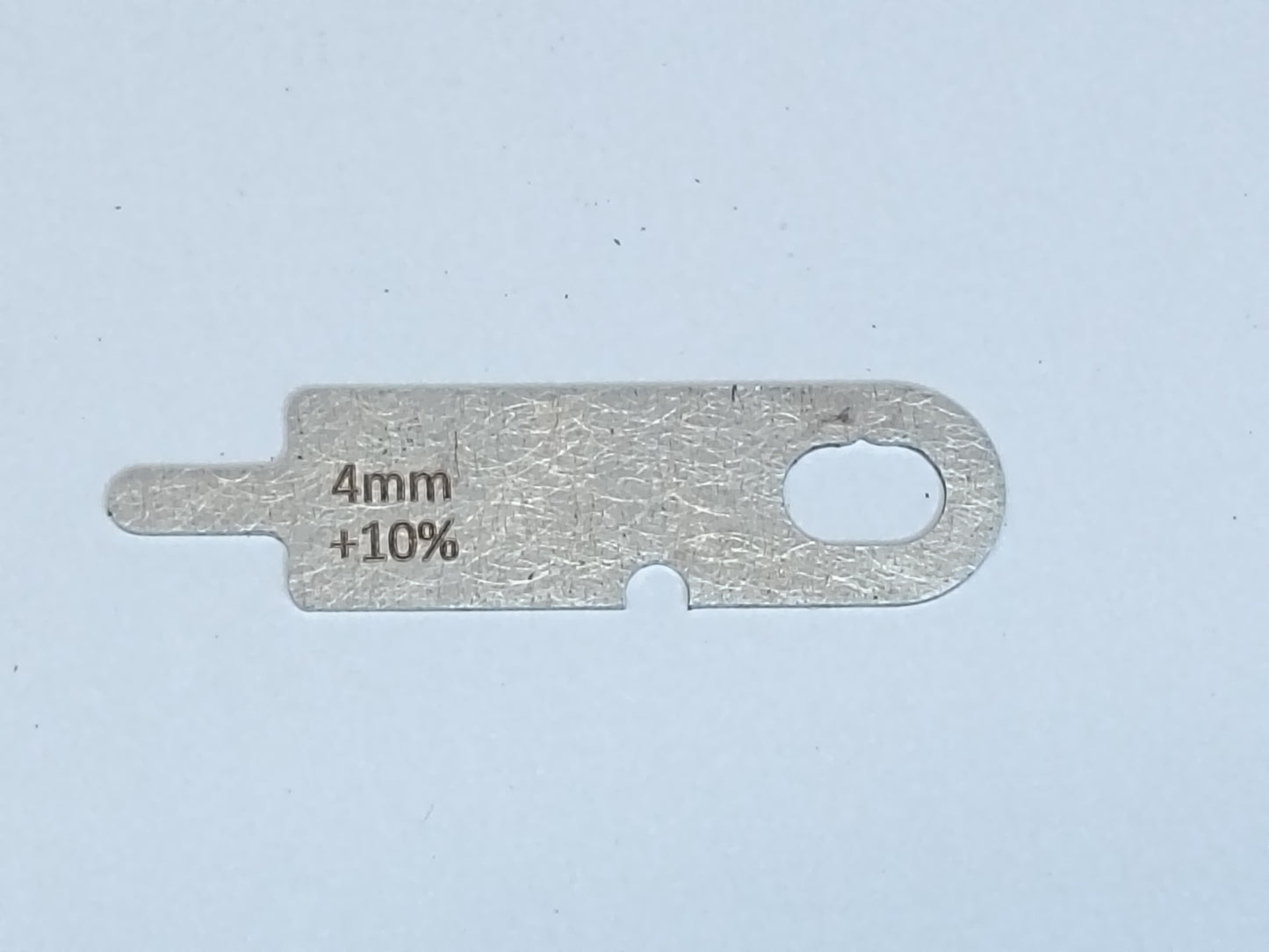wire rope and sheave gauge on a grey background