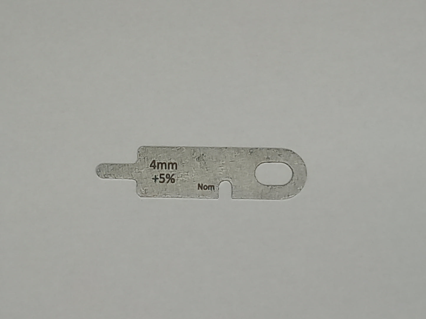 wire rope and sheave gauge on a grey background