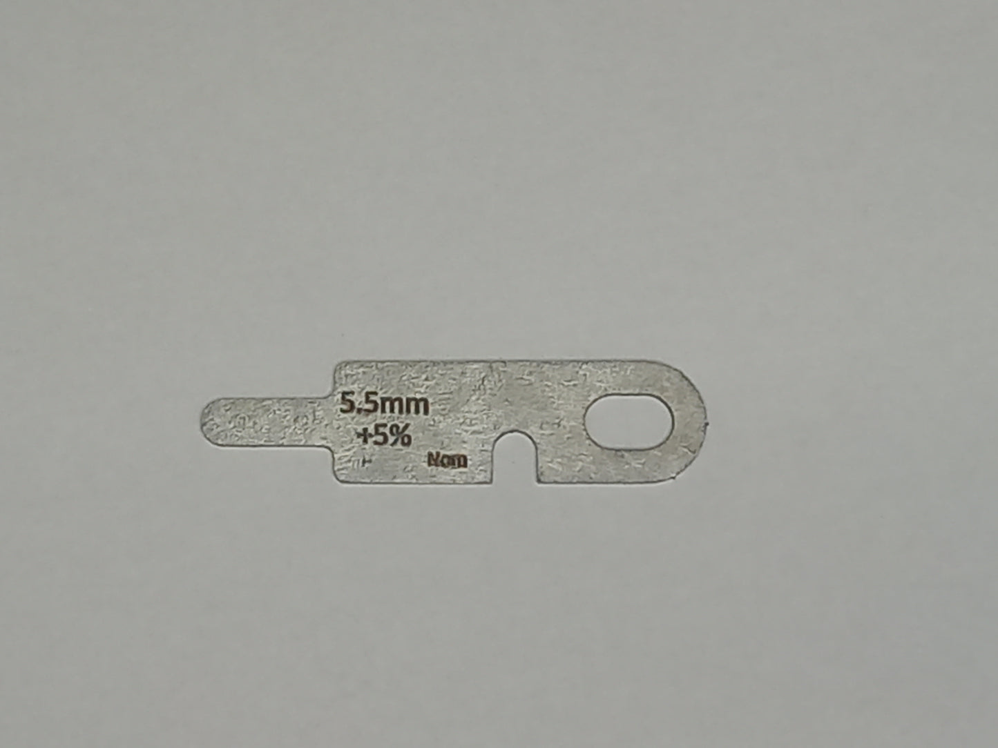 wire rope and sheave gauge on a grey background