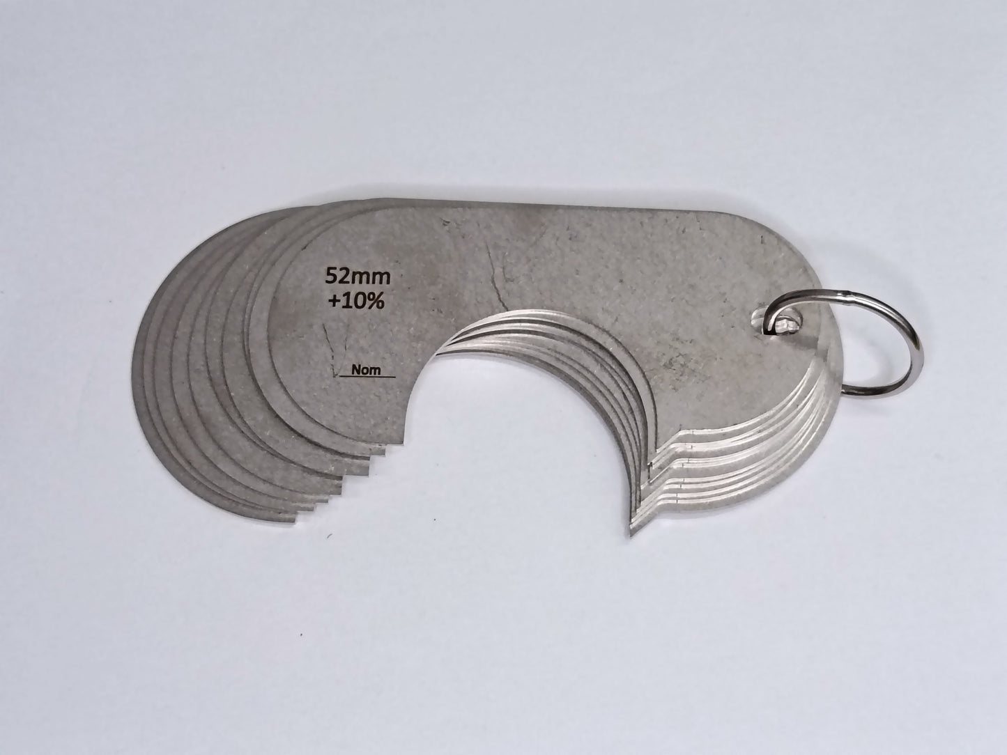 wire rope and sheave gauge on a grey background