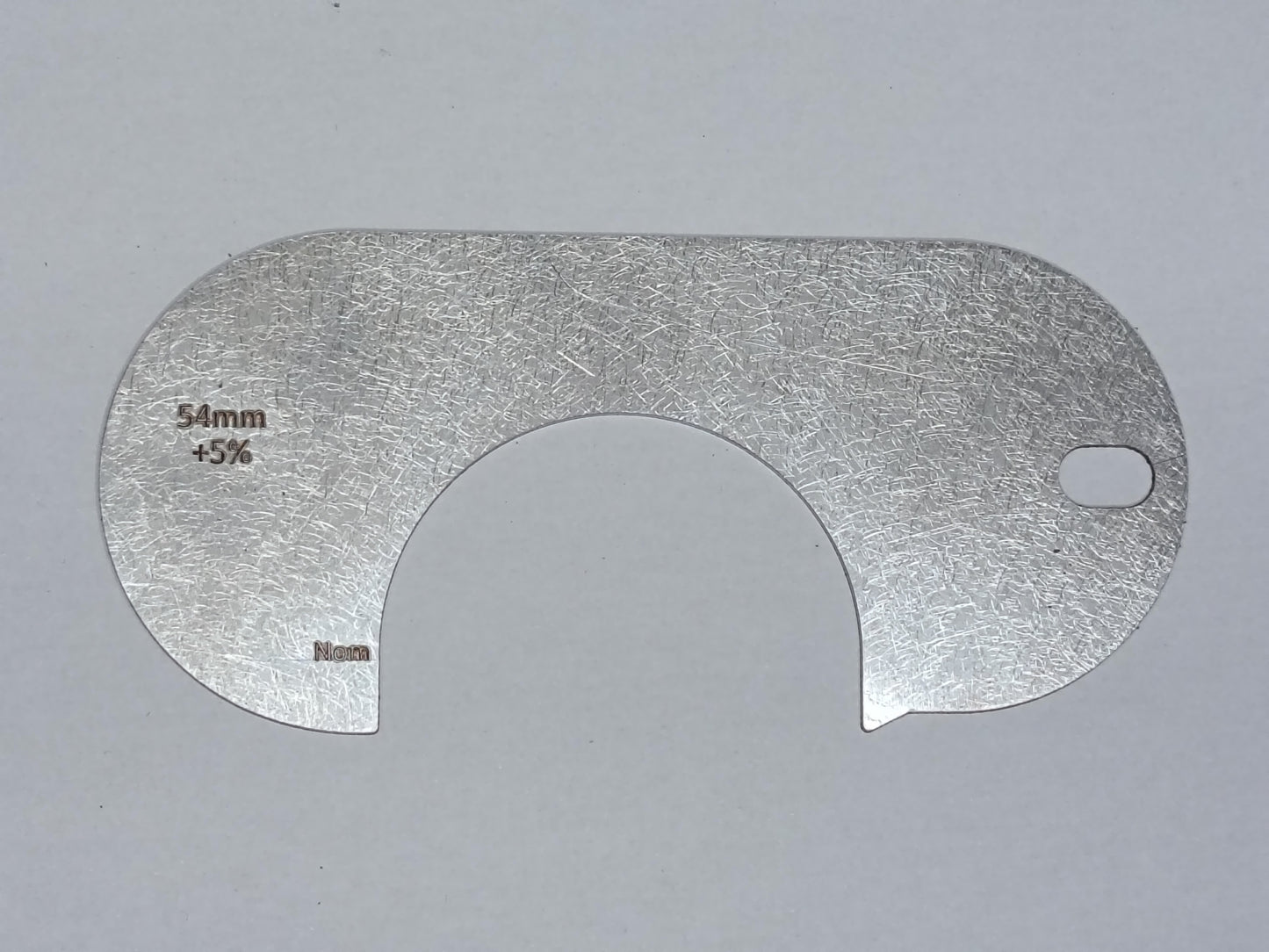 wire rope and sheave gauge on a grey background