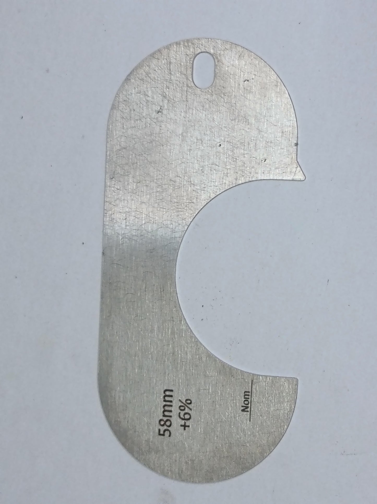 wire rope and sheave gauge on a grey background