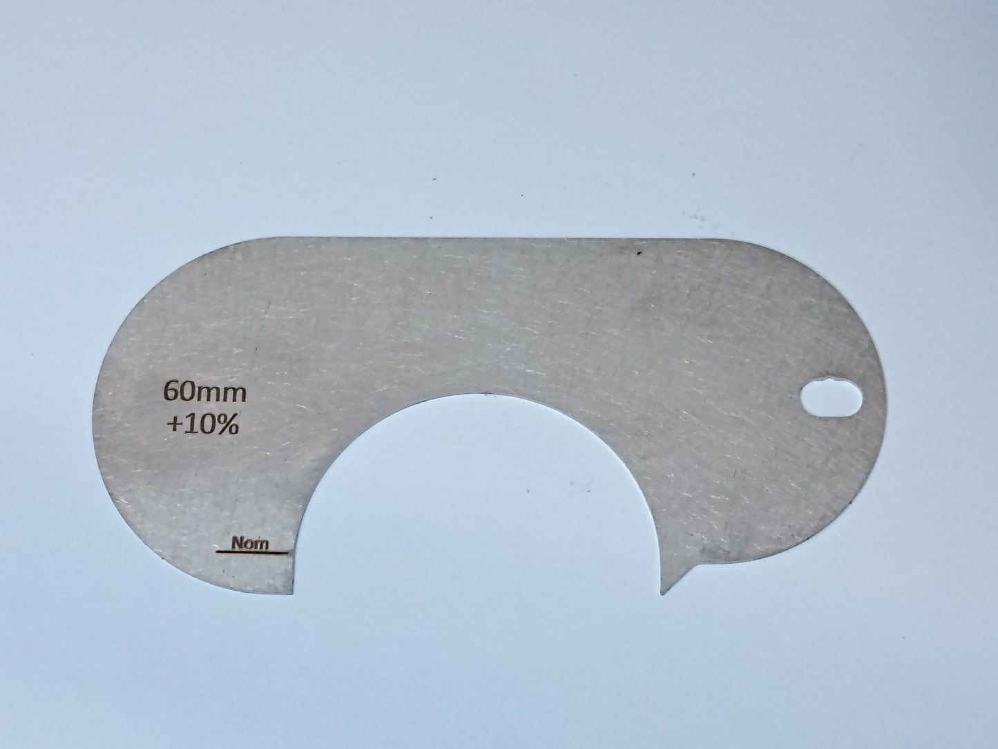 wire rope and sheave gauge on a grey background