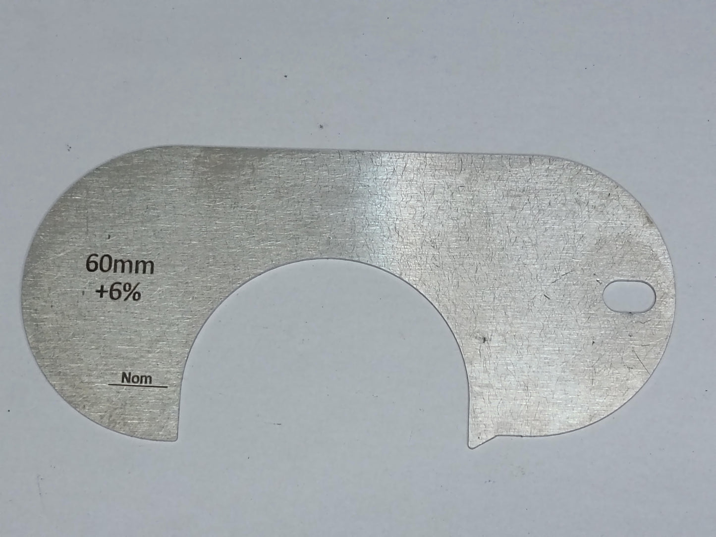 wire rope and sheave gauge on a grey background