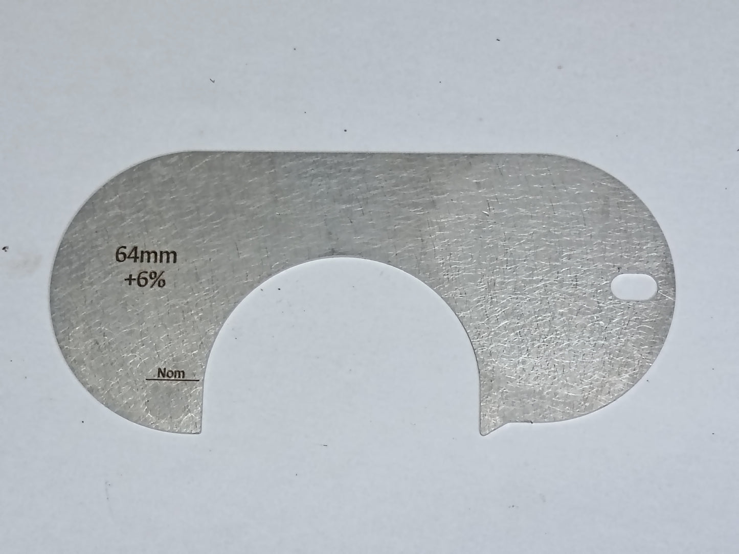 wire rope and sheave gauge on a grey background