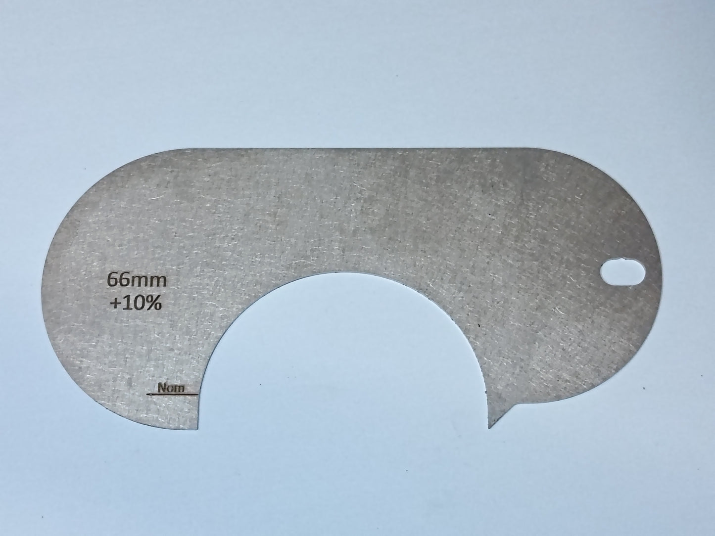 wire rope and sheave gauge on a grey background