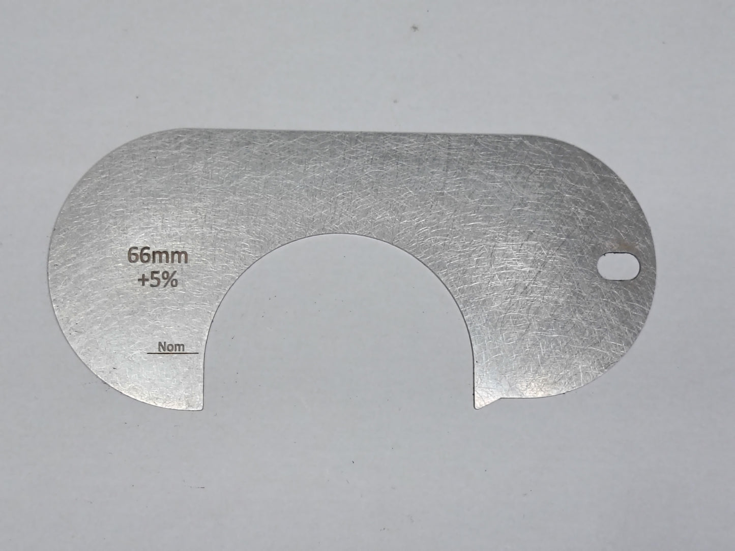 wire rope and sheave gauge on a grey background