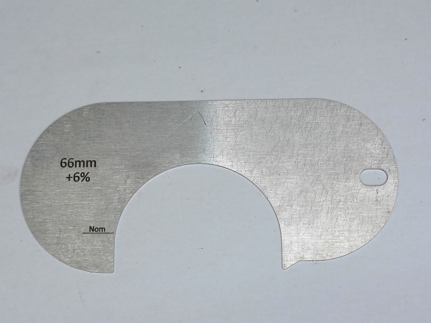 wire rope and sheave gauge on a grey background