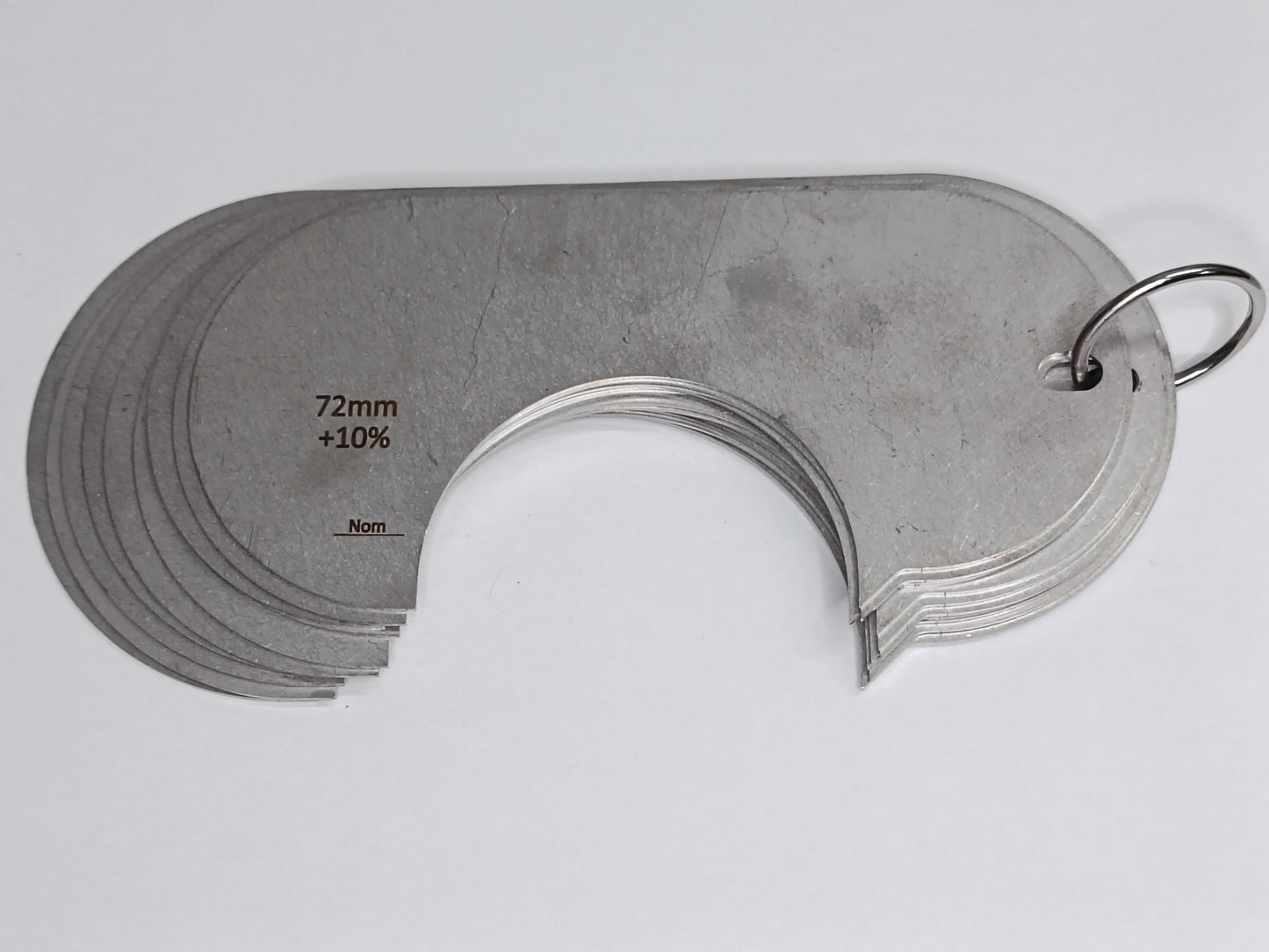wire rope and sheave gauge on a grey background