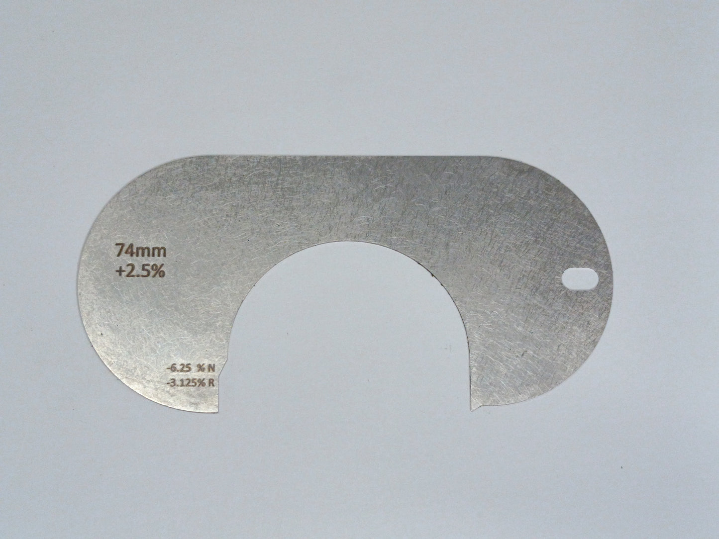 wire rope and sheave gauge on a grey background