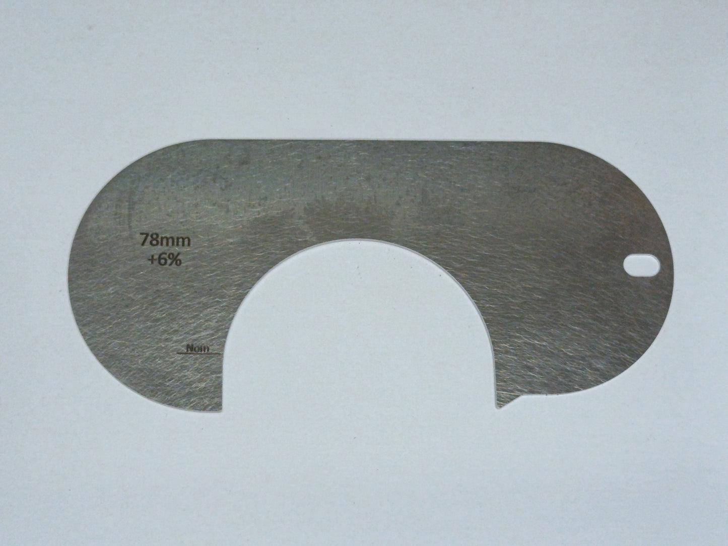 wire rope and sheave gauge on a grey background