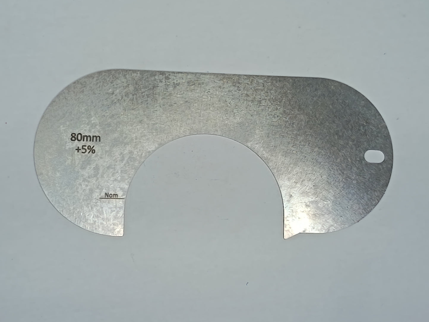 wire rope and sheave gauge on a grey background