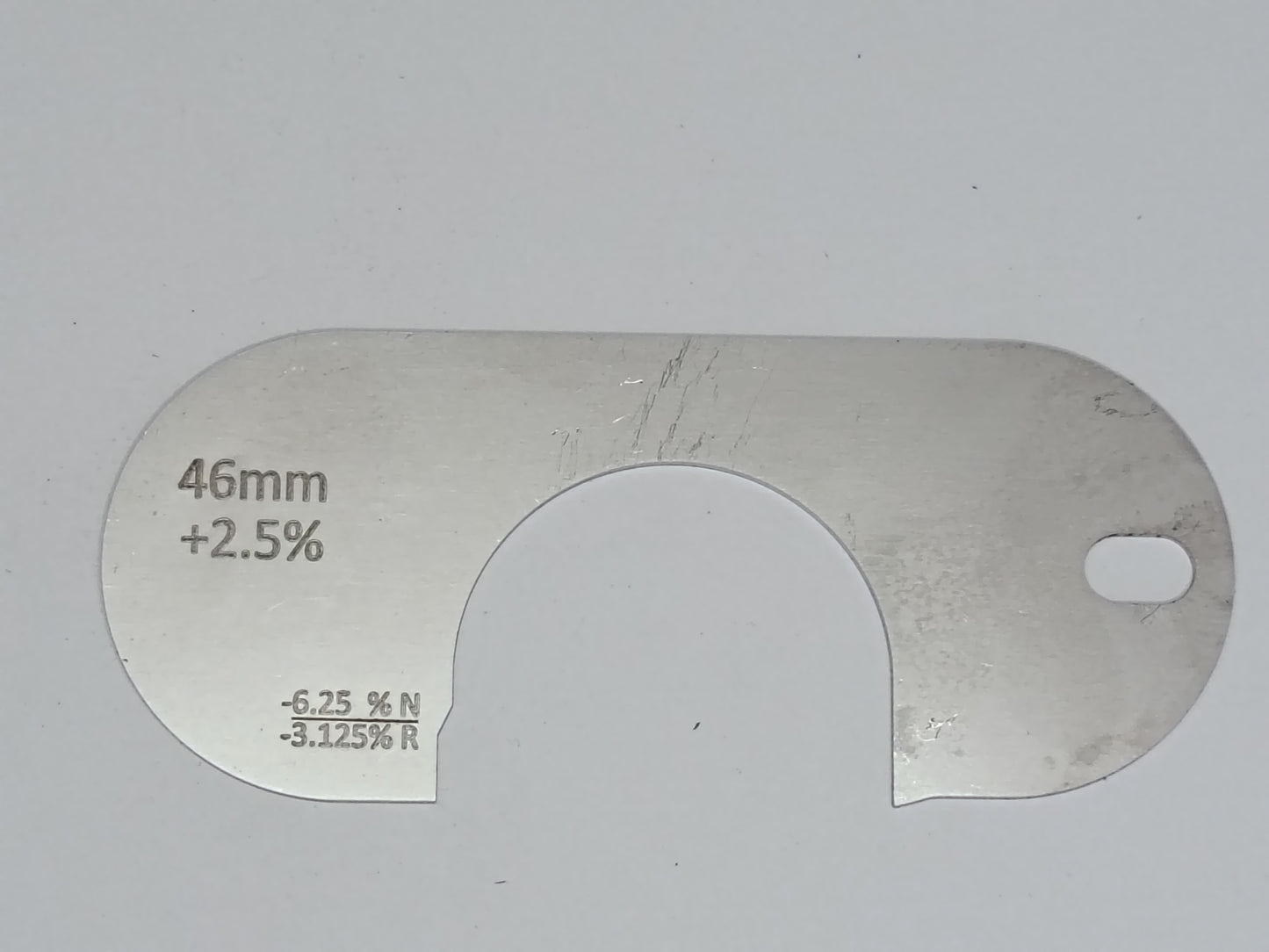 wire rope and sheave gauge on a grey background