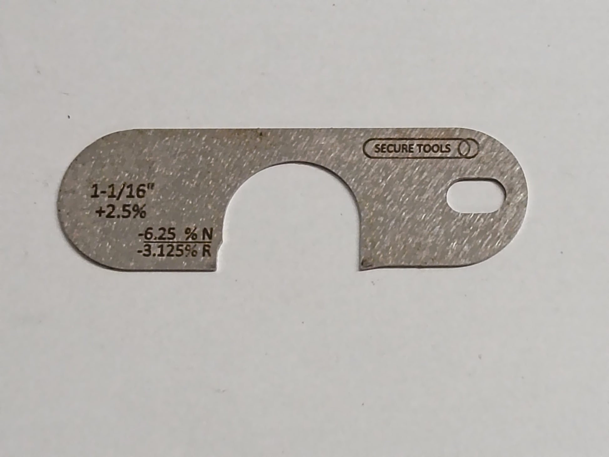 wire rope and sheave gauge  on a grey background