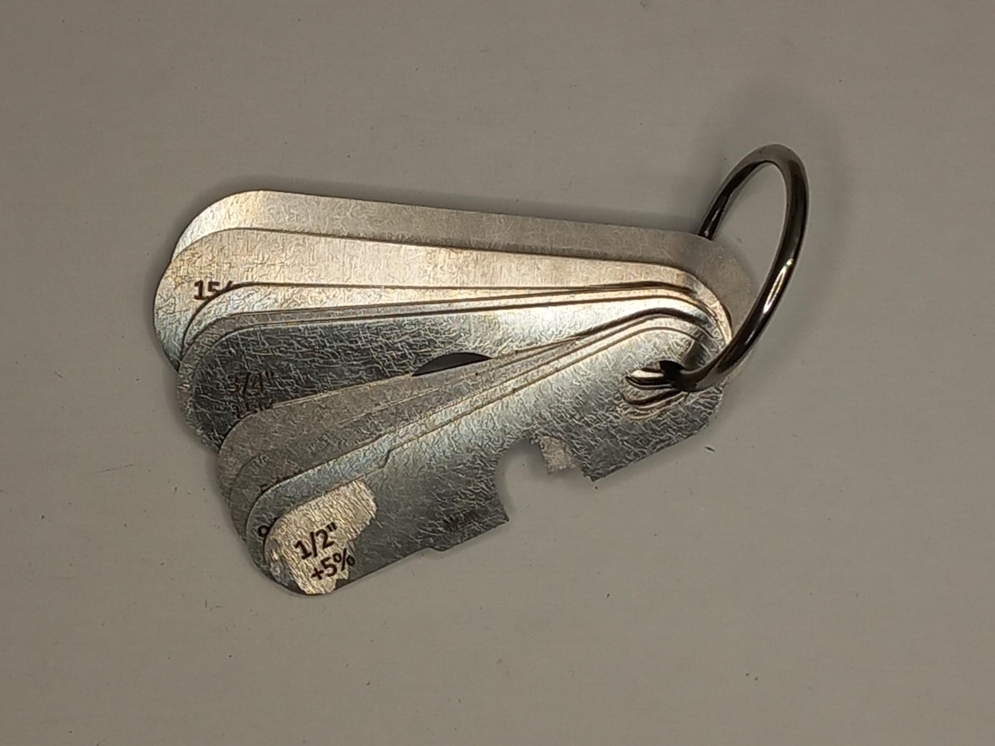 wire rope and sheave gauge  on a grey background