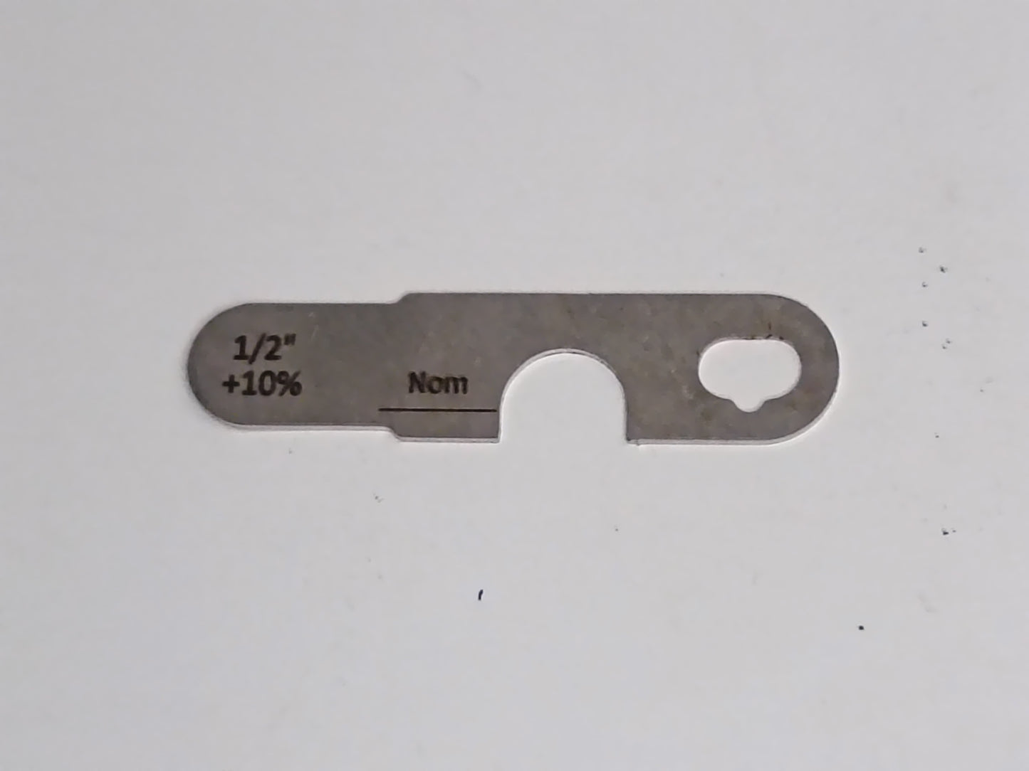 wire rope and sheave gauge  on a grey background