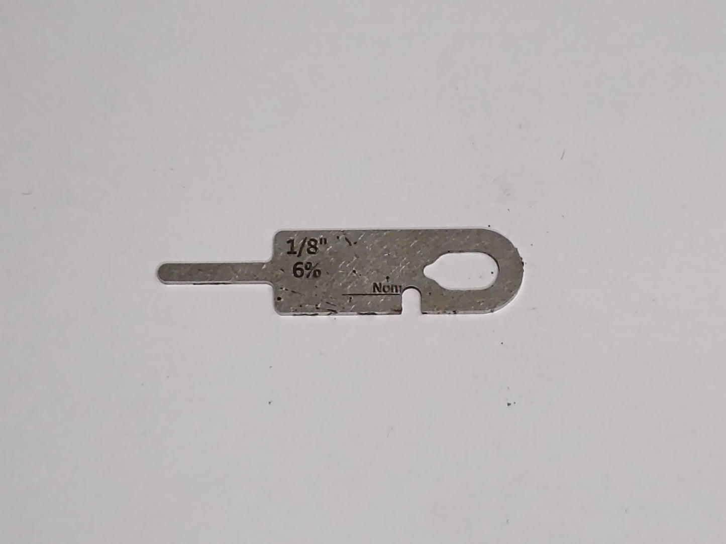 wire rope and sheave gauge  on a grey background