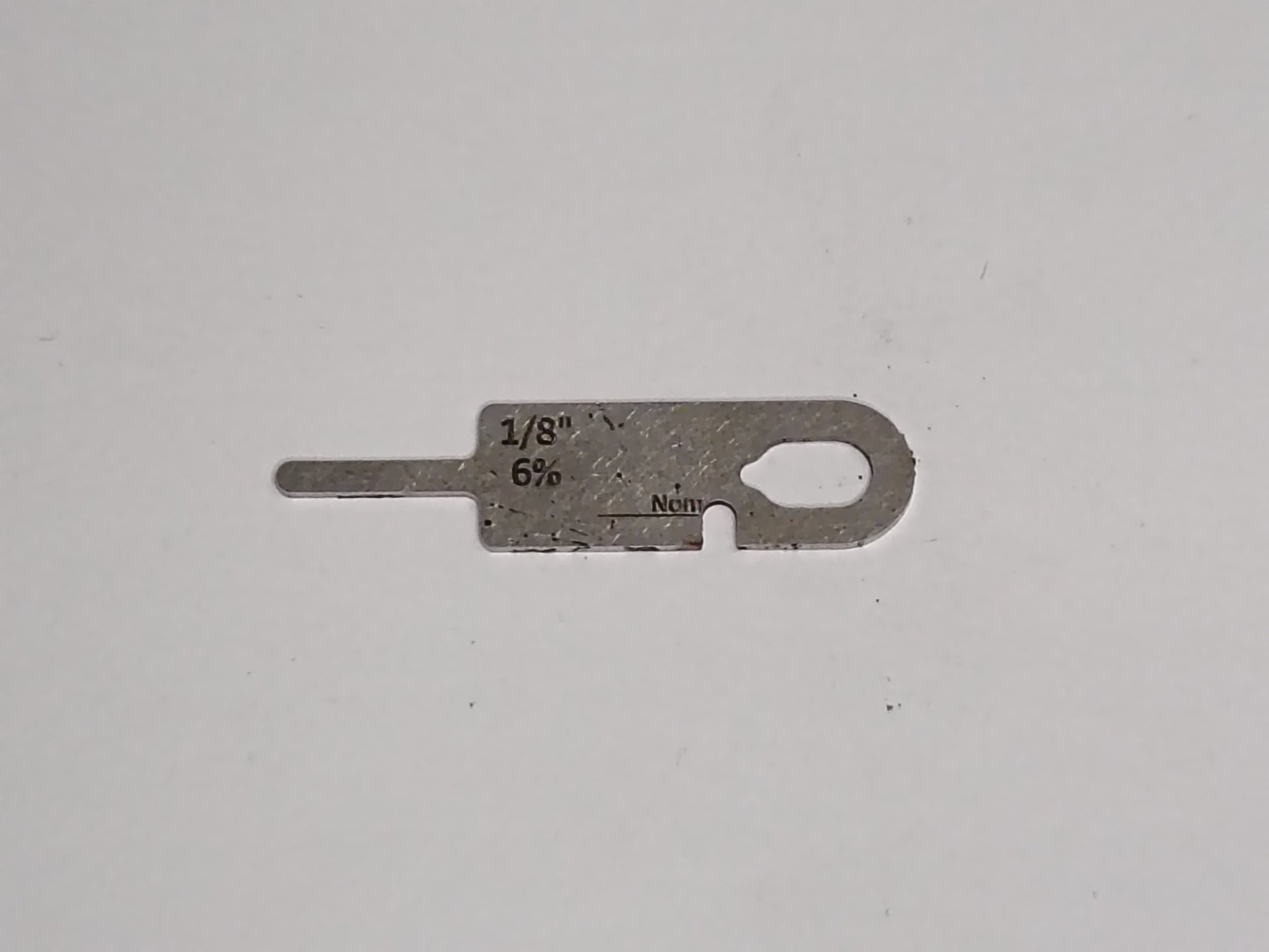 wire rope and sheave gauge  on a grey background