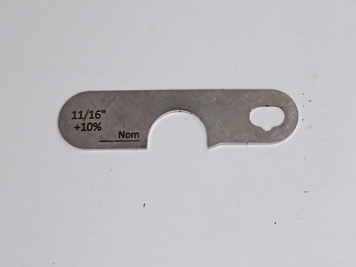 wire rope and sheave gauge  on a grey background