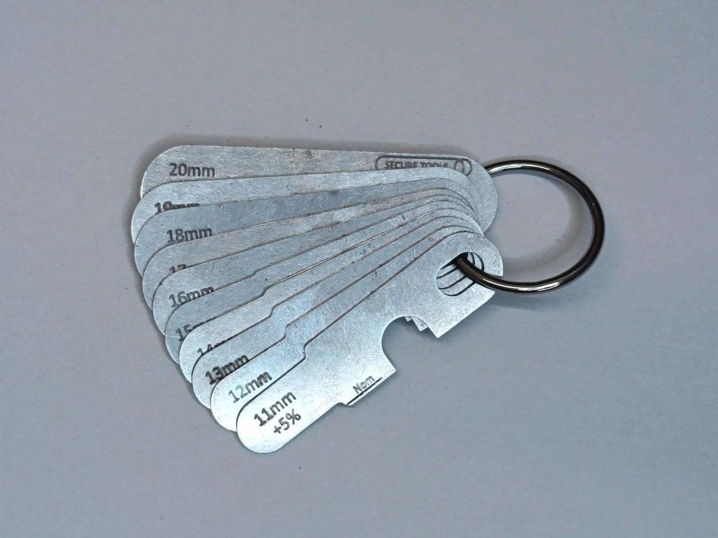 wire rope and sheave gauge  on a grey background